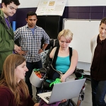 Kat Steele with students in lab