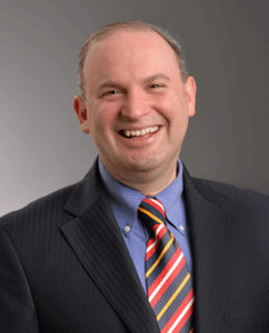 Jonathan Lazar headshot, smiling and wearing a suit and tie