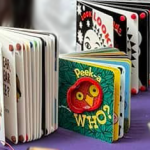 Childrens' books adapted with stick-on bumps for easy page turning.
