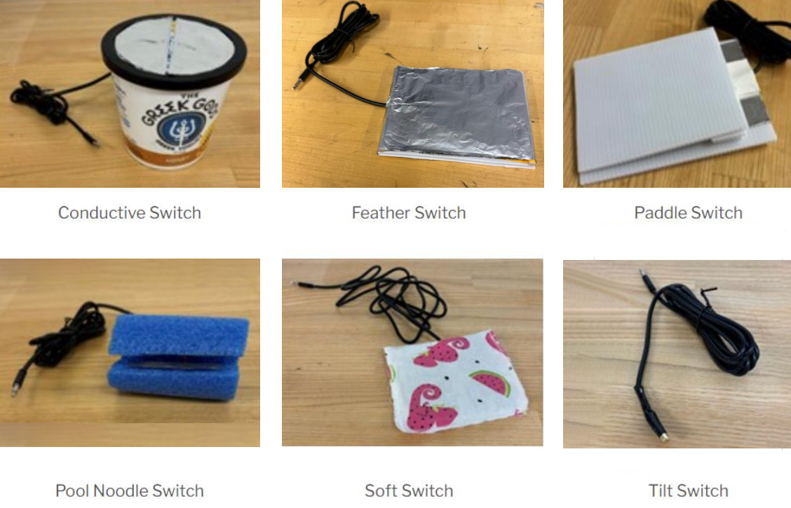 A sample of six switch kit varieties: A conductive switch placed on top of a yogurt container, a feather switch covered in foil, a paddle switch from two pieces of card connected by an accordion-folded piece, a switch made with a short segment of a pool noodle, a soft, fabric-covered switch, and a tilt switch that looks like a wound up cable.