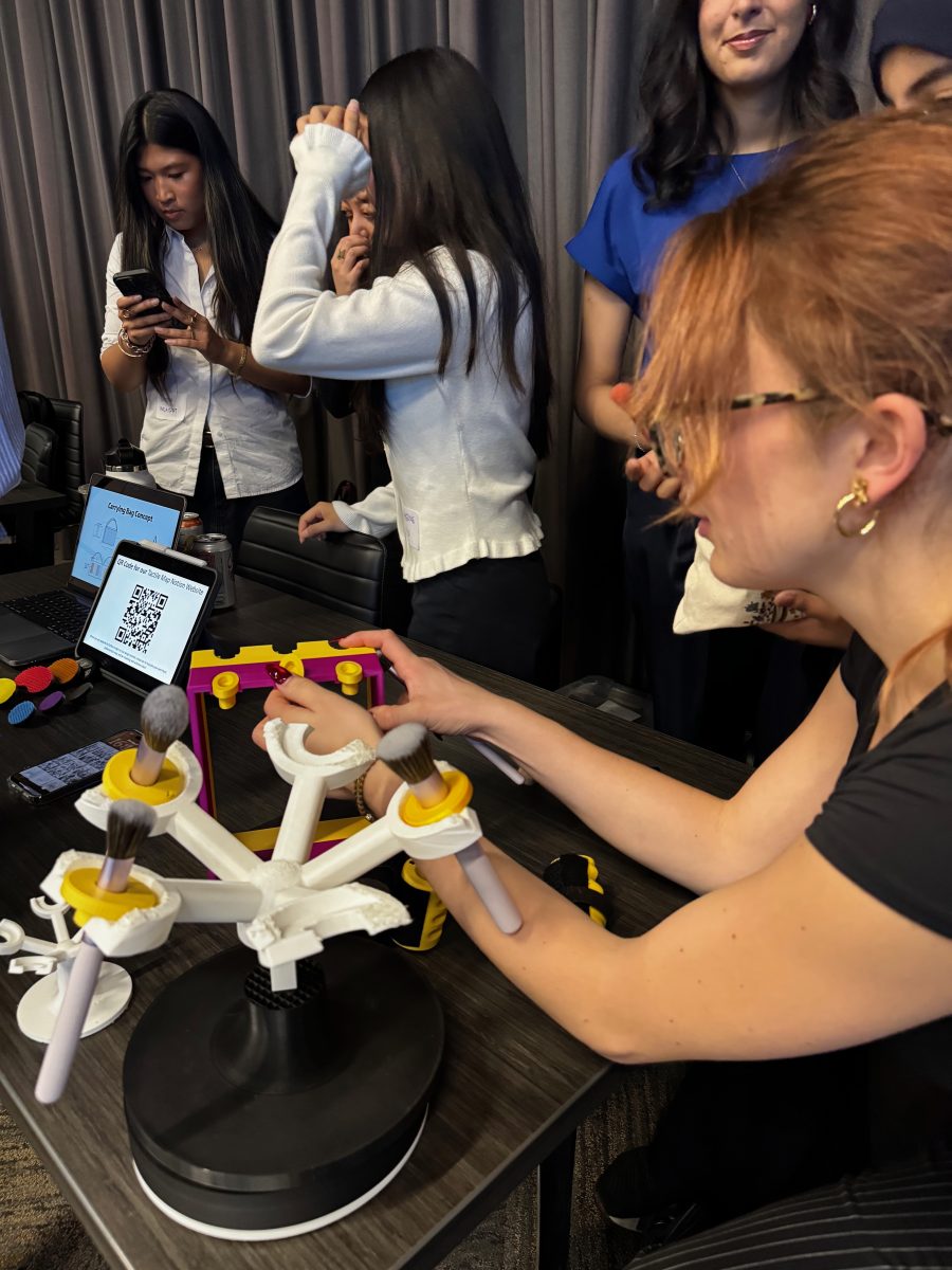 Student team presents their research and a prototype for Accessible Makeup.