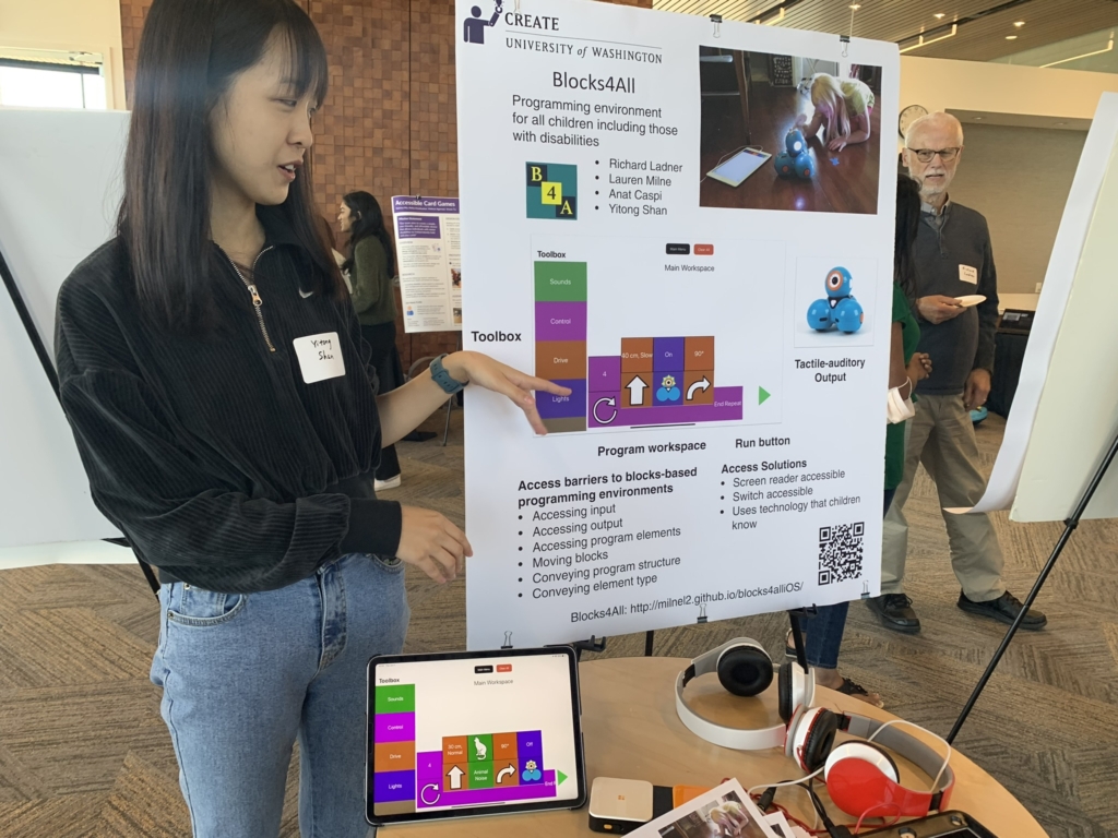 A student presents her poster for Blocks4All, a coding learning tool for visually impaired youth.